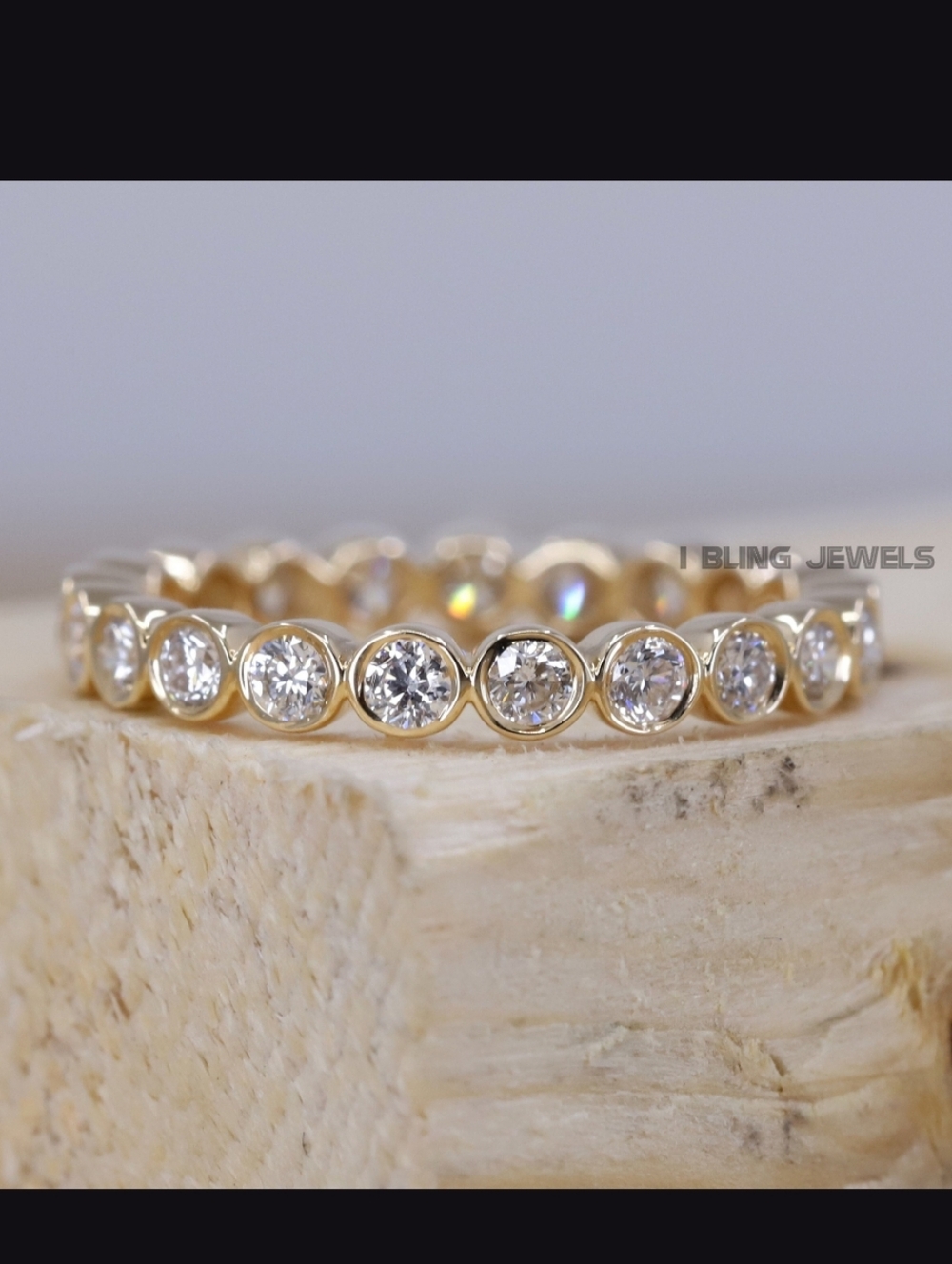 10k Yellow Gold and Moissanite Bezel Infinity Band